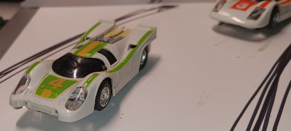 Tyco Porsche 917 Chrome/Lime/Yellow #4 Slot Car RUNS